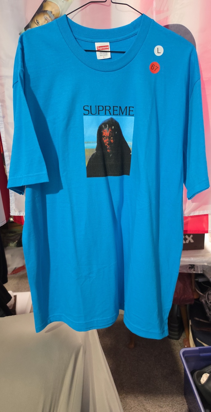 Supreme Bright Blue Graphic Tee with Black Center Image